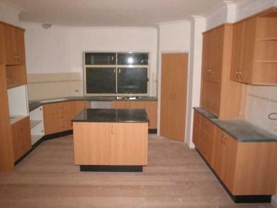 dusty kitchen awaits appliances