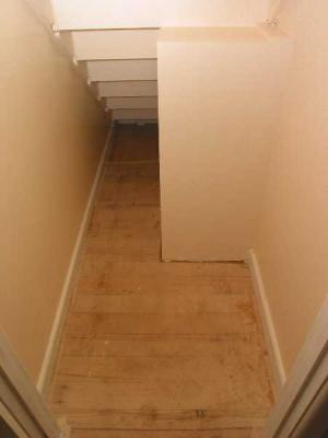under the stairs - note the heating return duct boxing