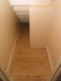 under the stairs - note the heating return duct boxing