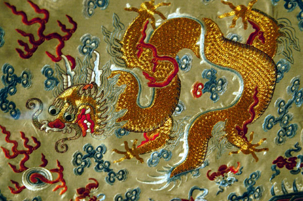 Detail of Qing dynasty court dress with dragon and cloud pattern