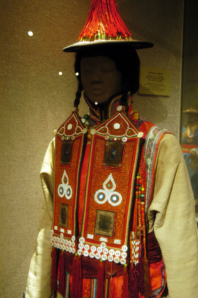 Yugur woman's festive attire, Zhangye, Gansu Province
