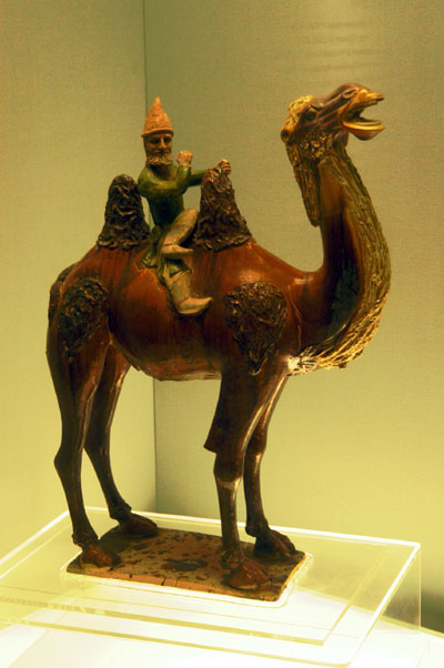 Polychrome glazed pottery of man on camel, Tang (618-907 AD)