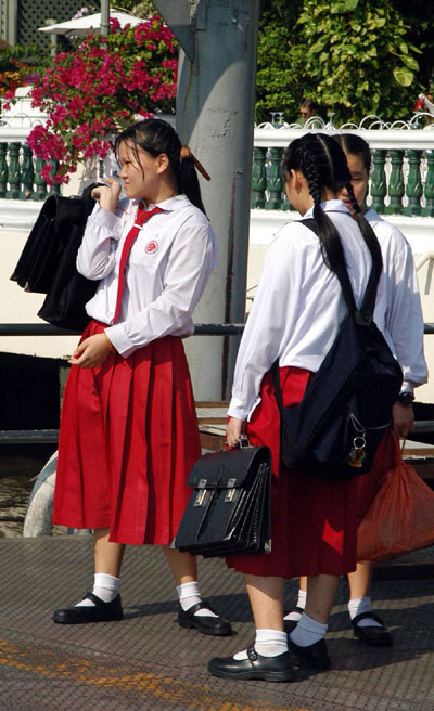 Thai schoolgirls on the pier