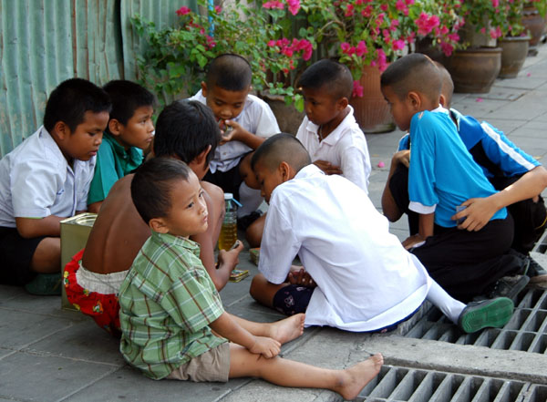 Kids playing cards, Thewet, Bangkok