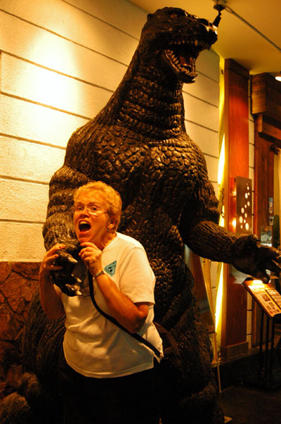 Mom being attacked by Godzilla, Japanese Street (Th. Taniya),