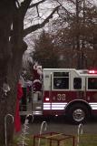 Santa arrives on fire truck