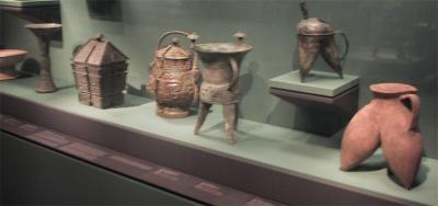 Clay and tin cups and jars.jpg