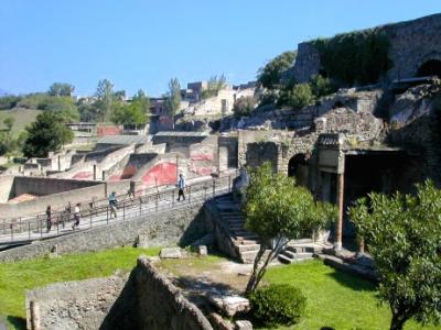 Pompeii - Porta Marina entrance. 2000 year old Roman (& some Etruscan) ruins. City wall & part of Imperial Villa on right side.
