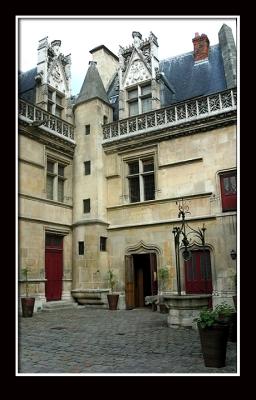 The main courtyard, with its well kerb