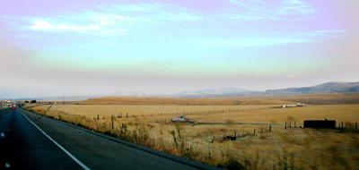 A shot taken through the windshield while driving south on I-580 east of the Altamont Pass, California