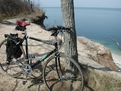 Yes, it's just over 100 feet straight down onto the Long Island Sound beach (note the Dr. Suess-like, undermined path in the background, straight over the bike's top tube).