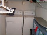 A spacious and convenient laundry/storage room is adjacent to the upstairs bathroom.   Florida04 030.jpg