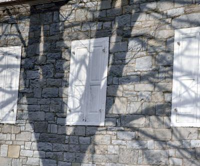 shadow on old stone church
