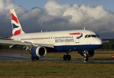 BA Airbus A320 against the backdrop of some spectacular clouds