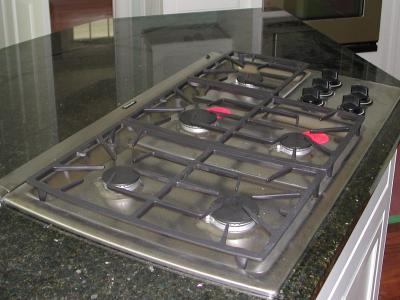 The Thermador cook top is placed in the granite