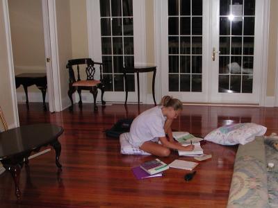 Sarah does homework the evening of our move