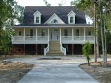 The driveway cement cures as work inside nears completion  08/23/2002