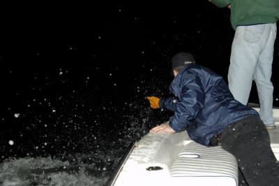 tommy and mike landing 90lb tarpon 04-09-05.jpg
