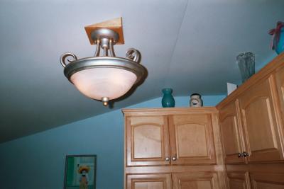 Sea Gull Athenia Hall/Foyer light in silver patina.   Click on pic for why it is mounted like this.