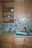 The reason we did a pastel backsplash... pastel Fiestaware and bad habits that have them sitting out a lot.