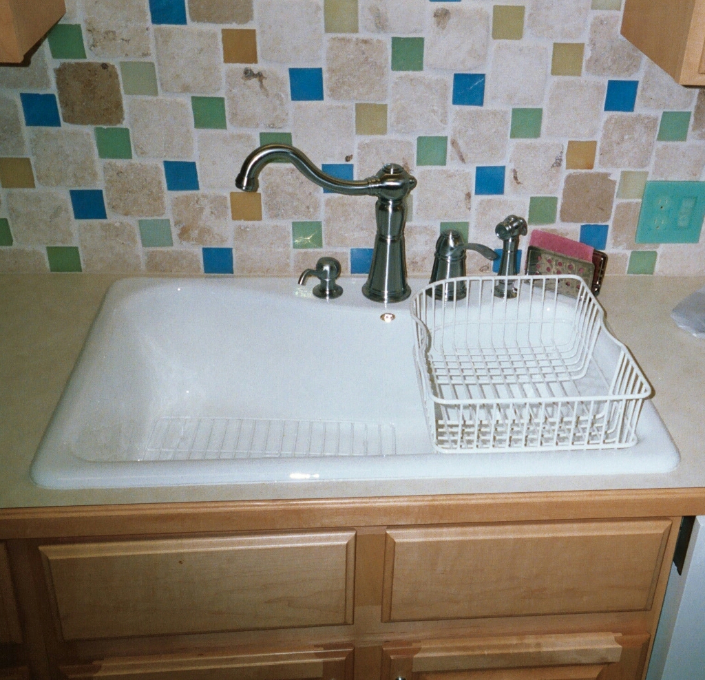 Eljer Gala sink, Pegasus faucet,stainless sponge holder, basket is for Kohler Executive Chef