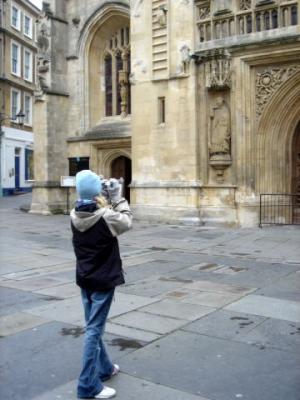 Julie taking a picture of Bath Abbey.