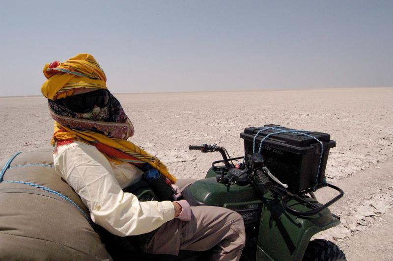 Karen on the ATV, Magkadikadi Pans, Botswana