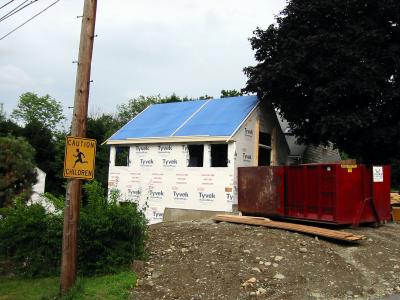 Roof with tarp.