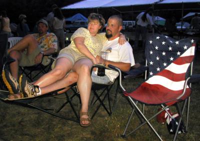 ...and a MASHOUT couple relax by the fire...