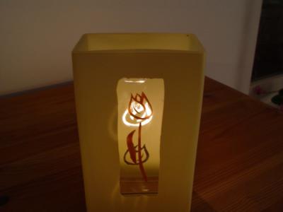 candle behind the vase by Misiek25