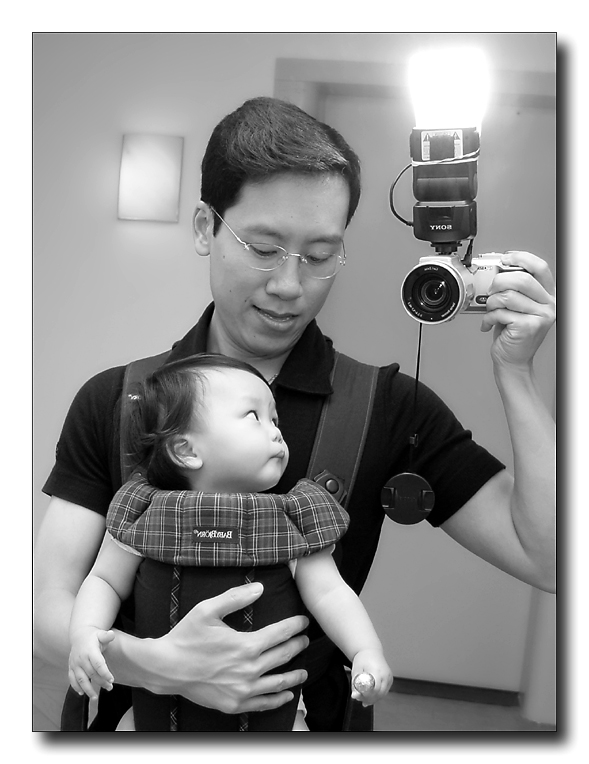 <B>2nd Place<br>Father and Photographer</B><BR><FONT size=2>by JoeSchmoe</FONT>