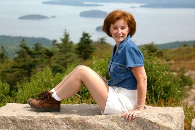 Charlotte at the top of Cadillac Mountain, Acadia National Park, Maine.