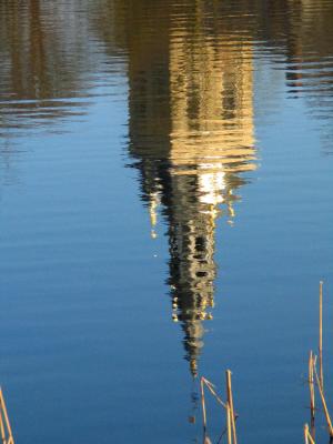 Tower reflected in pond