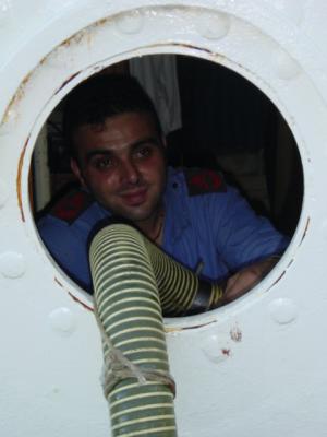 Italian sailor in the porthole with honey tube