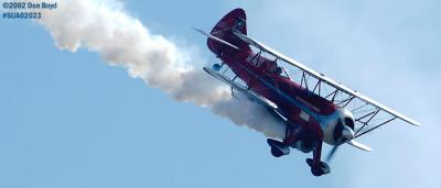 Jimmy Franklin's jet powered Waco UPF-7 bi-plane aviation air show stock photo