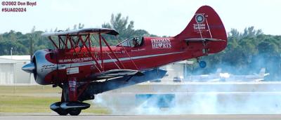 Jimmy Franklin's jet powered Waco UPF-7 bi-plane aviation air show stock photo