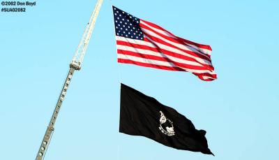 American and POW-MIA flags air show stock photo