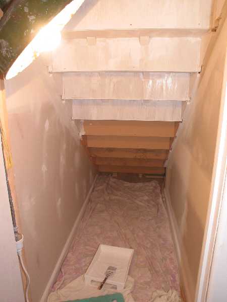 painting under the stairs