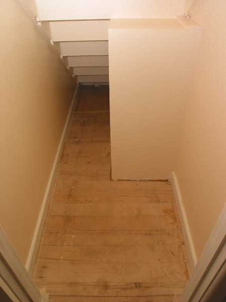 under the stairs - note the heating return duct boxing