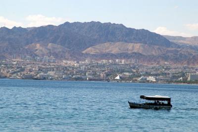 Glass bottom boat on the Gulf of Aqaba with Elat, Israel a short distance away