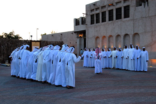 Traditional dance troupe in front of the Sheikh Saeed Al Maktoum house