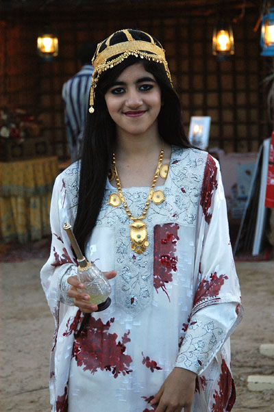 UAE girl with rosewater dispenser
