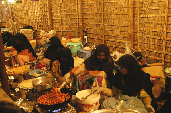 Women making traditional food