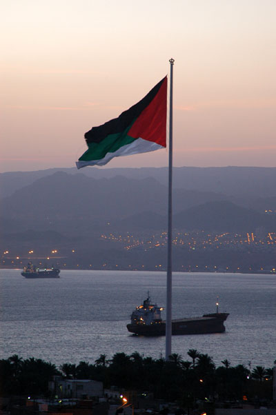 Flag of the Great Arab Revolt at dusk, Aqaba