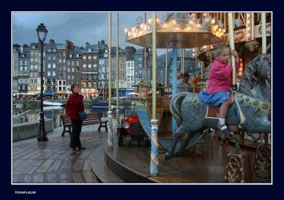 Enjoying Honfleur merry-go-round