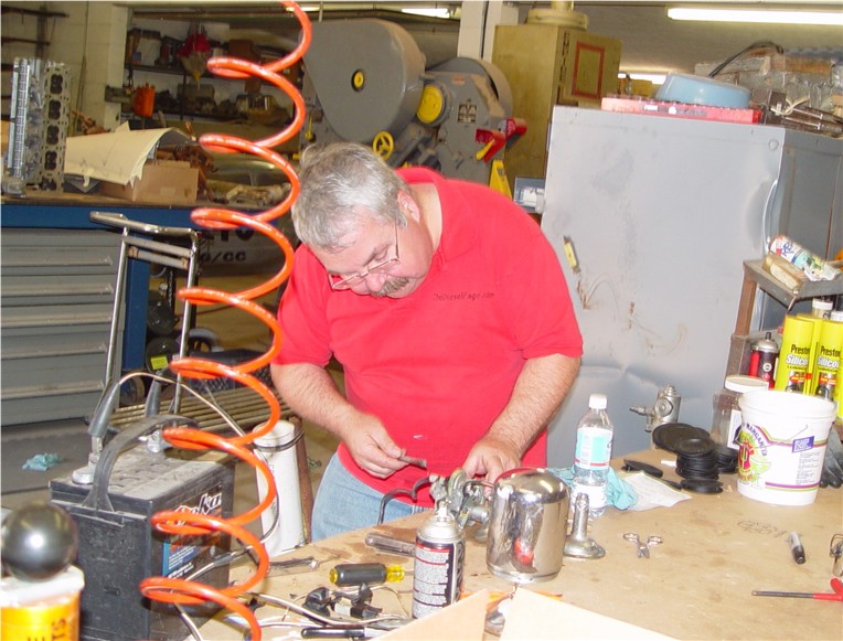 ROB ROBINSON IS HARD AT WORK REPAIRING MY ROOF SPOT LIGHT, BEFORE REINSTALLING IT