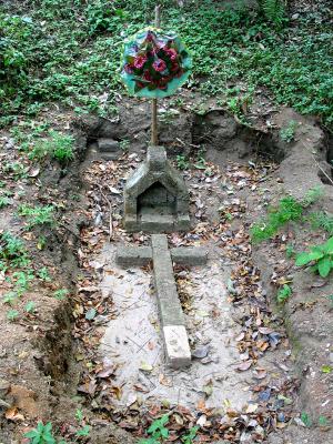sunken grave, crosses