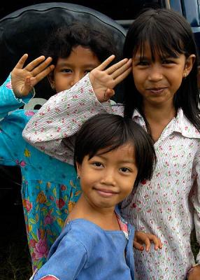 Alue Bilie, Sumatra, Indonesia -young girls salute in their best form
