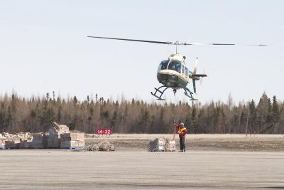 Attaching a net of supplies for Moose Factory
