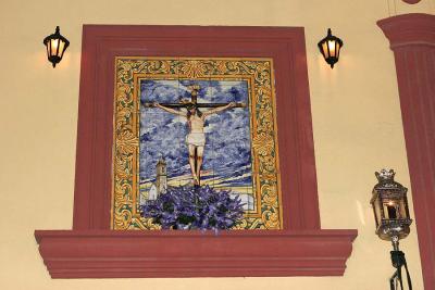 Tiles depicting crucified Christ on church wall  1201_edited-1.jpg
